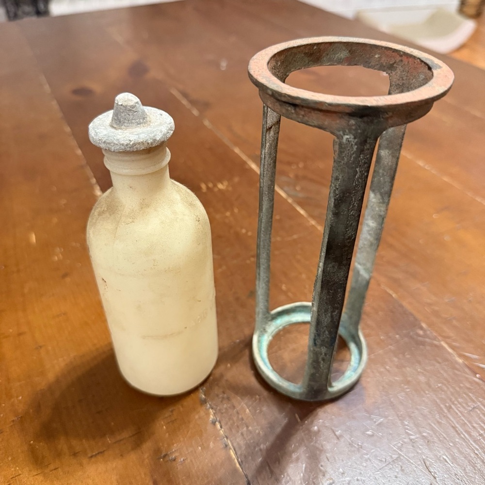 Antique soda-acid fire extinguisher plastic bottle, metal cage
